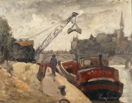 Loads with a crane barge on the Seine
